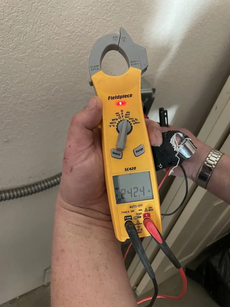 Voltage testing with clamp meter during Circuit Breaker Repair in Hardyston